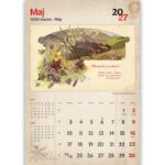 Motiv slovenskih gora in zelenih travnikov na arhivski fotografiji iz prejšnjega stoletja.